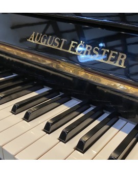 Used upright piano August FÖRSTER 104 lacquered black brass fittings